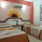 Habitación en Zihuatanejo con 2 camas para hasta 4 Personas. Hotel Familiar Zihuatanejo. Habitaciones en el Centro de Zihuatanejo para Vacaciones. Casas de Huéspedes en Ixtapa Zihuatanejo
